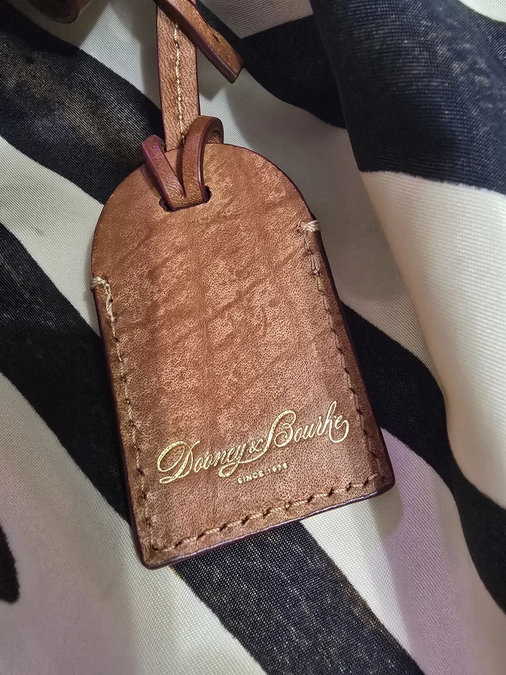Dooney & Bourke Black and White Zebra Stripe Tote with Brown Leather Handles